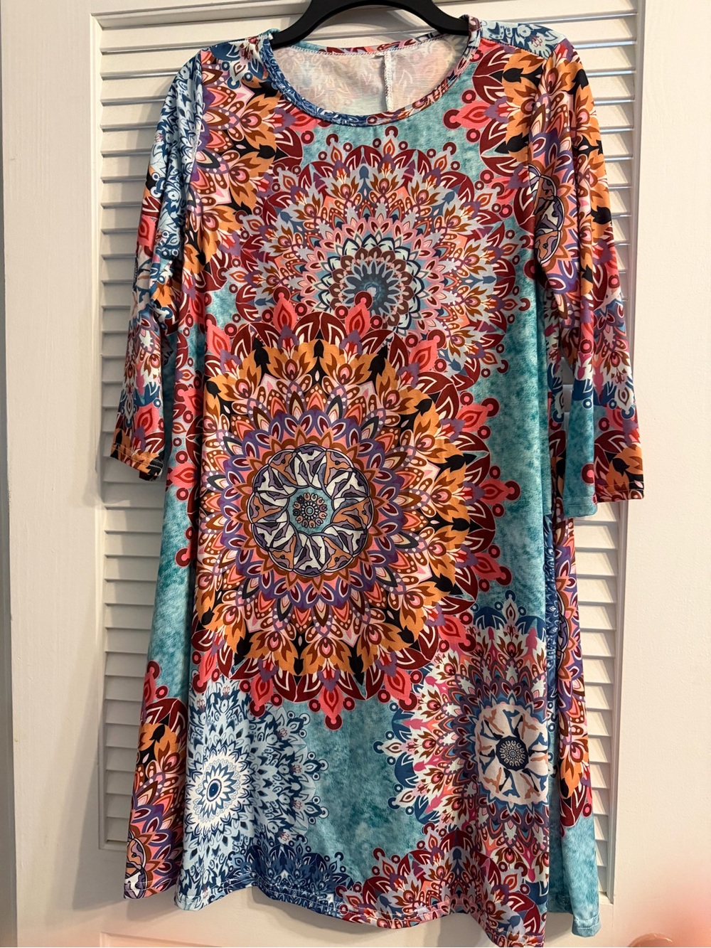 Misses 3/4 sleeve polyester printed dress w/pockets.